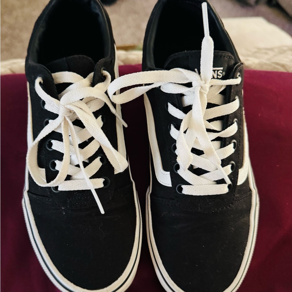 Vans women’s Classic Black and White Sneakers